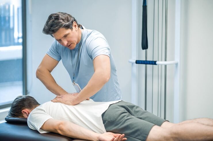 back massage male patient having session rehabilitation back massage 259150 71574