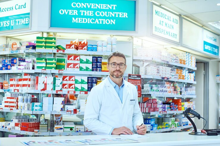 i have make note everything cropped portrait handsome mature male pharmacist working pharmacy 590464 31008