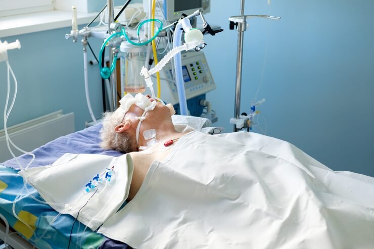 intubated adult white man avl lying coma intensive care department critical condition 133994 2857